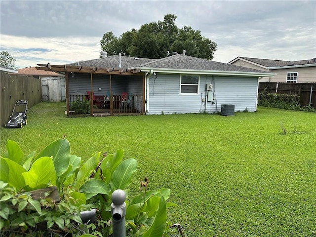 3278 Glen Eagle Ln, Kenner, LA 70065 - rear view of house with cooling unit and roof with shingles