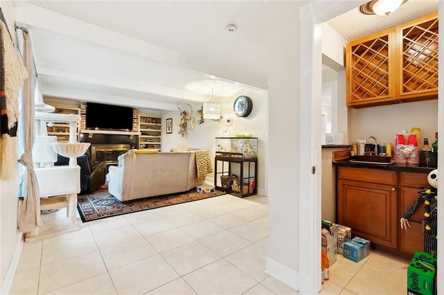 3931 S Post Oak Ave, New Orleans, LA 70131 - living room with light tile patterned floors and baseboards