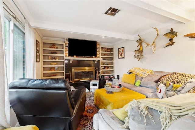 3931 S Post Oak Ave, New Orleans, LA 70131 - living area with beam ceiling, built in shelves, and a brick fireplace