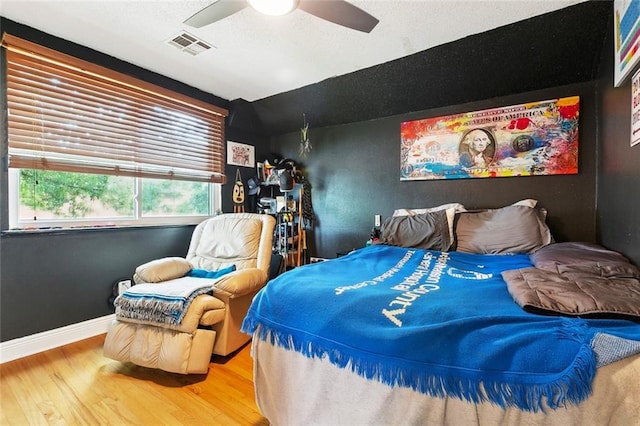 3931 S Post Oak Ave, New Orleans, LA 70131 - bedroom featuring wood finished floors, a ceiling fan, and baseboards