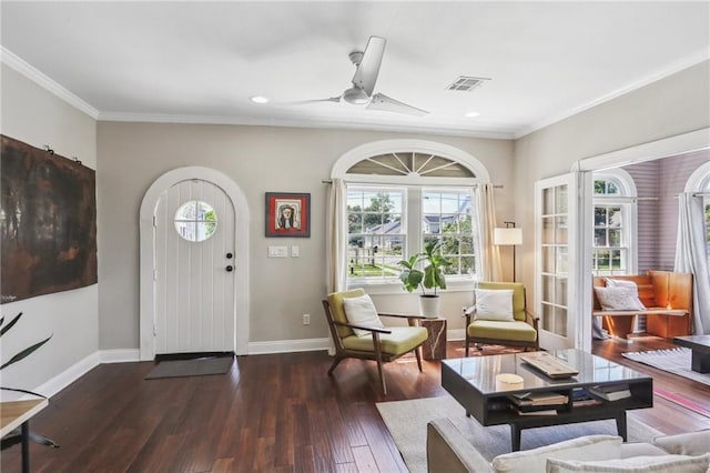 foyer entrance featuring wood finished floors, baseboards, a ceiling fan, ornamental molding, and recessed lighting