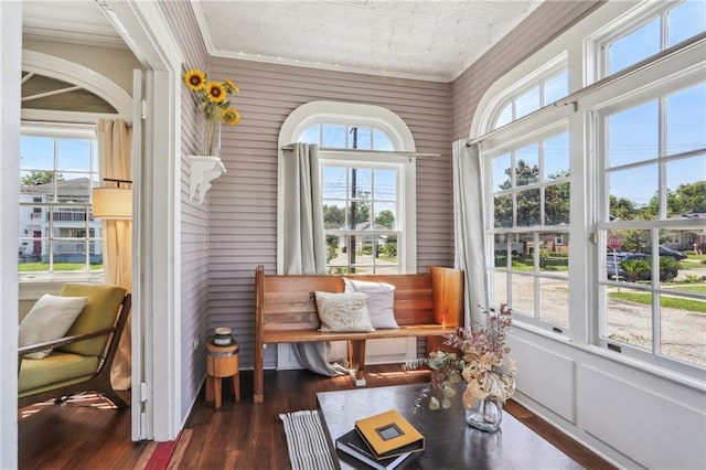 sunroom / solarium featuring plenty of natural light