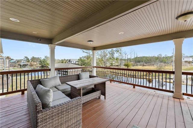 11020 Delaware St, Bay Saint Louis, MS 39520 - deck featuring a water view and an outdoor hangout area