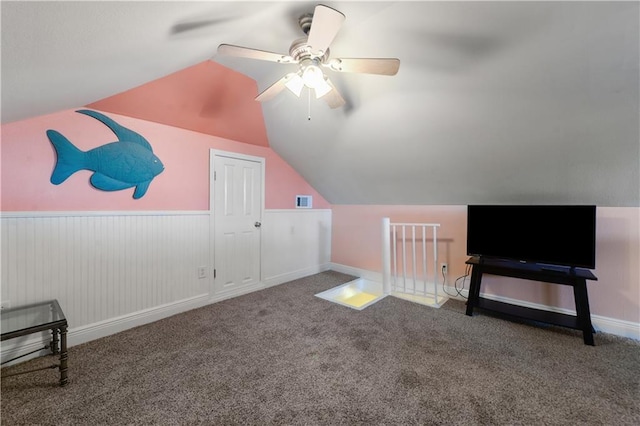 11020 Delaware St, Bay Saint Louis, MS 39520 - bonus room featuring lofted ceiling, a ceiling fan, carpet flooring, and a wainscoted wall