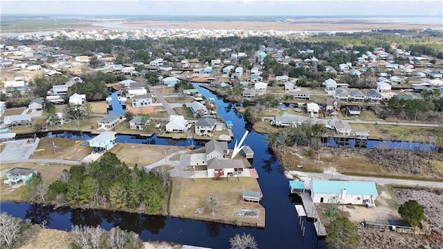 11020 Delaware St, Bay Saint Louis, MS 39520 - aerial view of property and surrounding area with a large body of water and nearby suburban area