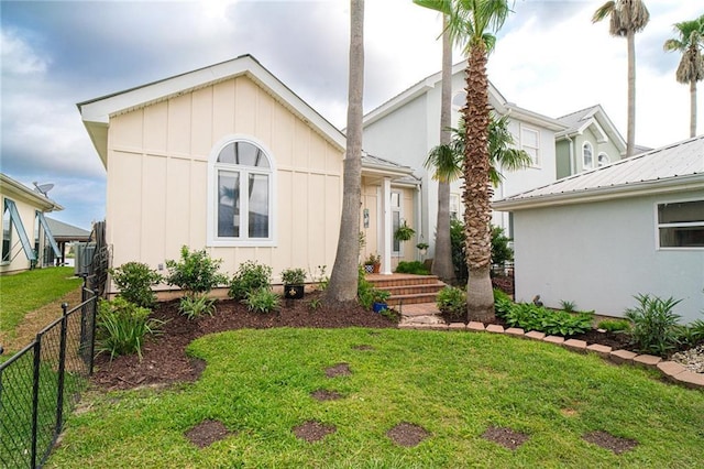 1413 Royal Palm Dr Unit A, Slidell, LA 70458 - view of front of house featuring board and batten siding