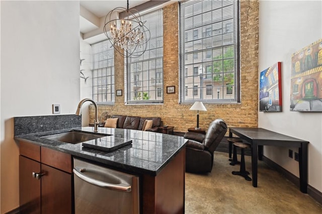920 Poeyfarre St Unit 109, New Orleans, LA 70130 - bar area featuring a sink, dishwasher, a chandelier, carpet, and baseboards
