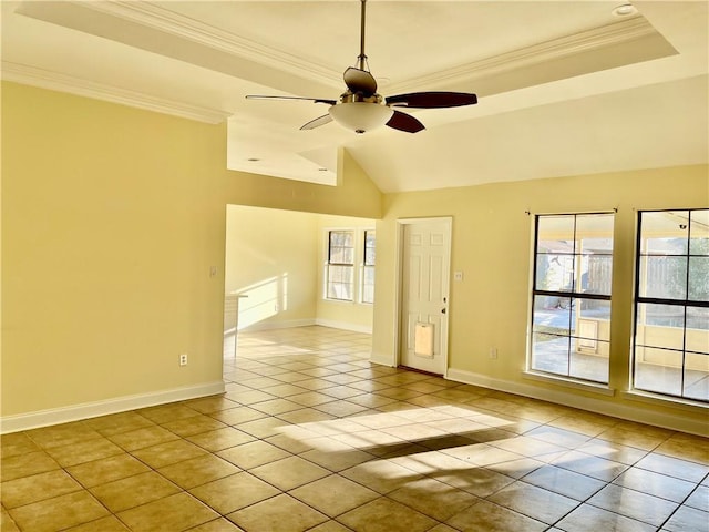 35 Derek Ln, La Place, LA 70068 - empty room featuring light tile patterned floors, a ceiling fan, a tray ceiling, ornamental molding, and lofted ceiling