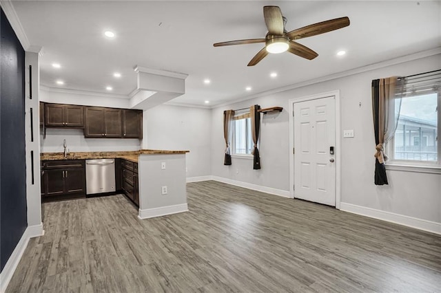 500 Lake Marina Ave Unit 408, New Orleans, LA 70124 - kitchen featuring stainless steel dishwasher, ornamental molding, ceiling fan, open floor plan, and dark brown cabinets