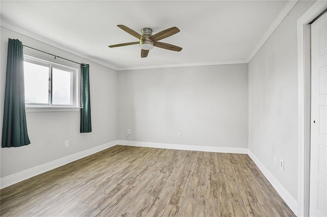 500 Lake Marina Ave Unit 408, New Orleans, LA 70124 - spare room featuring a ceiling fan, wood finished floors, and ornamental molding