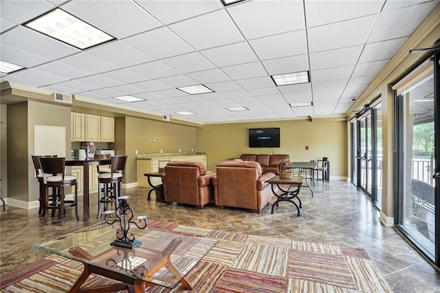 500 Lake Marina Ave Unit 408, New Orleans, LA 70124 - living area with baseboards and a drop ceiling