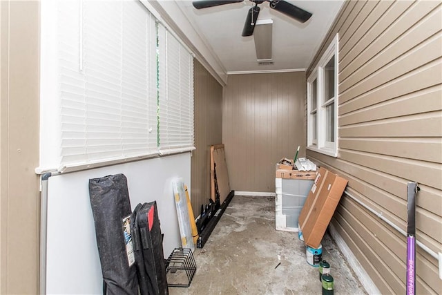710 W Michigan St, Hammond, LA 70401 - hall with ornamental molding, concrete floors, and wooden walls