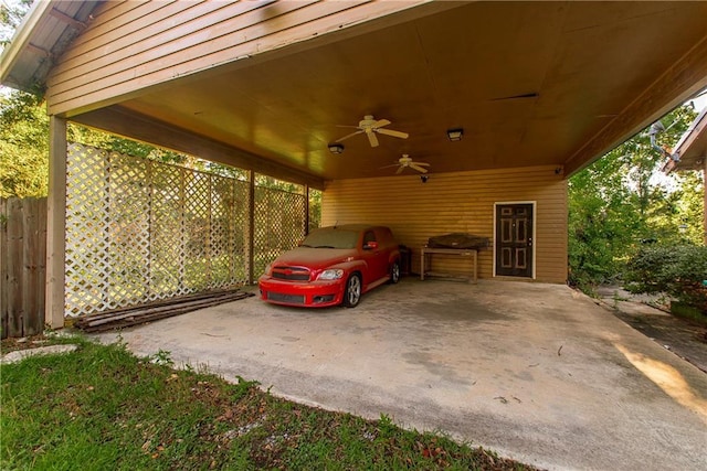 710 W Michigan St, Hammond, LA 70401 - view of car parking featuring a ceiling fan, an attached carport, and fence