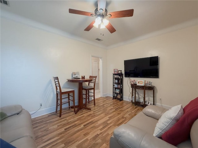 28 San Jose Ave, Jefferson, LA 70121 - living area with wood finished floors, a ceiling fan, crown molding, and baseboards