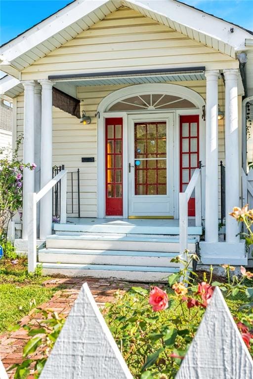 2437 Jonquil St, New Orleans, LA 70122 - property entrance with a porch
