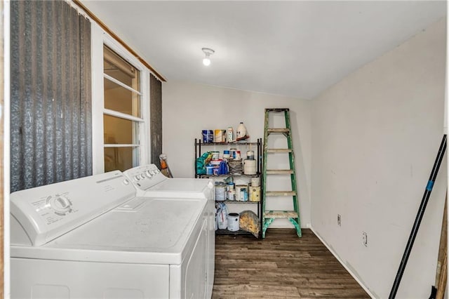2437 Jonquil St, New Orleans, LA 70122 - laundry area with independent washer and dryer and dark wood-type flooring