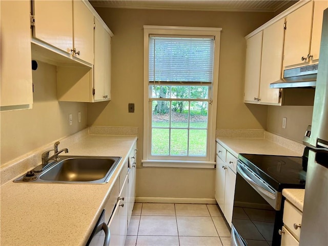 204 W 11th Ave Unit 4, Covington, LA 70433 - kitchen with stainless steel appliances, a sink, under cabinet range hood, light countertops, and crown molding