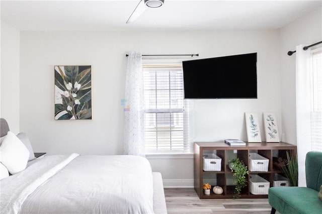 2522 Robert St, New Orleans, LA 70115 - bedroom featuring wood finished floors and baseboards
