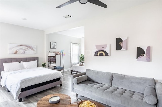 2522 Robert St, New Orleans, LA 70115 - bedroom featuring wood finished floors, ceiling fan, and baseboards