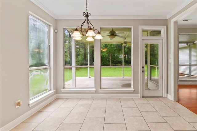 213 Secluded Oaks Ln, Madisonville, LA 70447 - entryway with plenty of natural light, crown molding, baseboards, and light tile patterned flooring