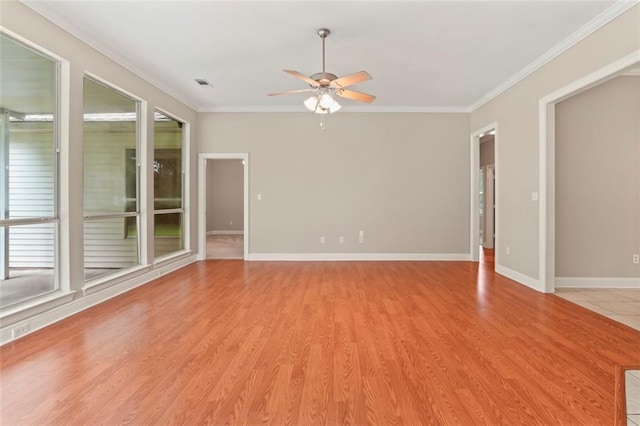 213 Secluded Oaks Ln, Madisonville, LA 70447 - spare room with ceiling fan, ornamental molding, light wood finished floors, and baseboards