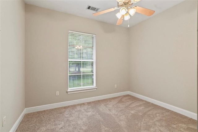 213 Secluded Oaks Ln, Madisonville, LA 70447 - carpeted empty room featuring plenty of natural light, baseboards, and ceiling fan