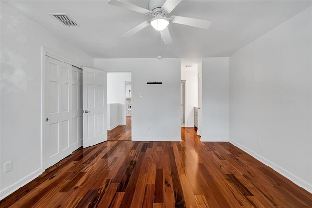 343 Lake Ave, Metairie, LA 70005 - unfurnished bedroom featuring baseboards, wood finished floors, and a closet