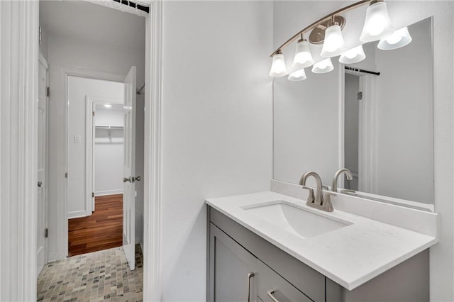 343 Lake Ave, Metairie, LA 70005 - bathroom featuring vanity and a chandelier