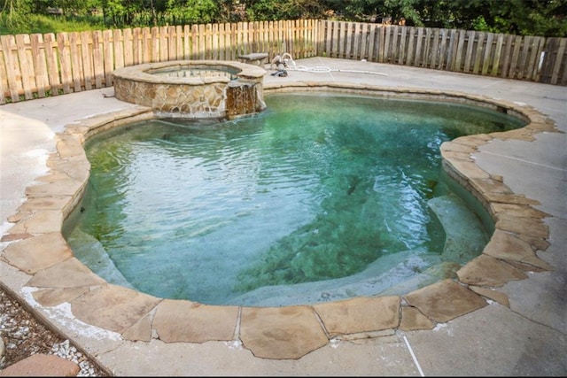 42262 Yokum Rd, Ponchatoula, LA 70454 - view of swimming pool featuring a fenced backyard and a pool with connected hot tub