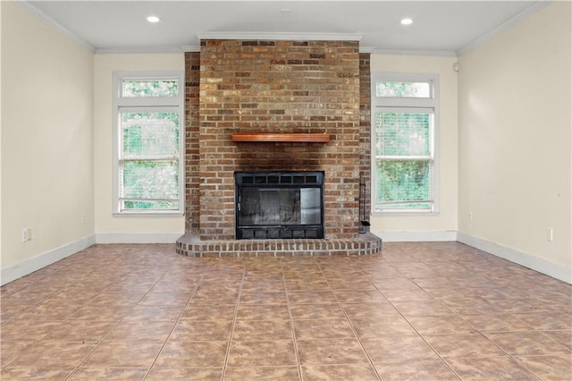 42262 Yokum Rd, Ponchatoula, LA 70454 - unfurnished living room featuring healthy amount of natural light, a fireplace, ornamental molding, recessed lighting, and tile patterned flooring