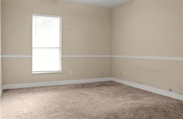 42262 Yokum Rd, Ponchatoula, LA 70454 - spare room with carpet floors and healthy amount of natural light