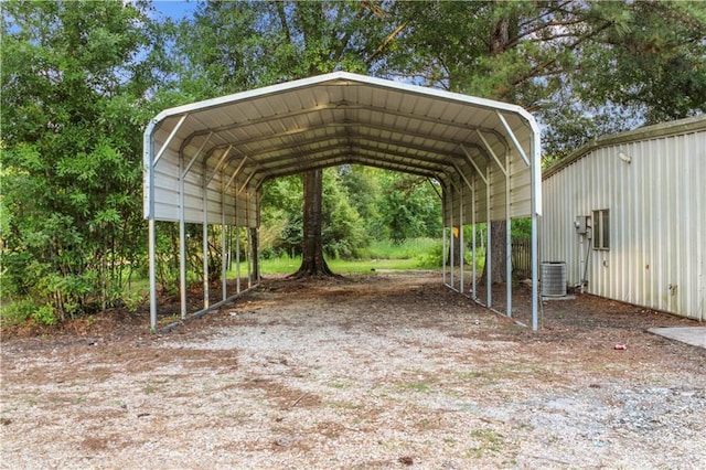 42262 Yokum Rd, Ponchatoula, LA 70454 - view of parking / parking lot featuring a detached carport and dirt driveway
