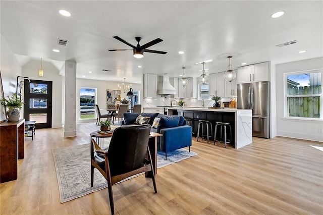 5116 Wilson Dr, Metairie, LA 70003 - living room with recessed lighting, light wood finished floors, baseboards, and a ceiling fan