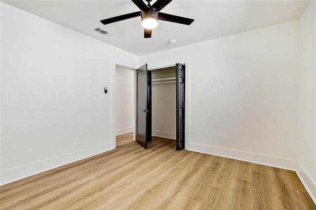 5116 Wilson Dr, Metairie, LA 70003 - unfurnished bedroom with light wood-style floors, baseboards, a closet, and ceiling fan