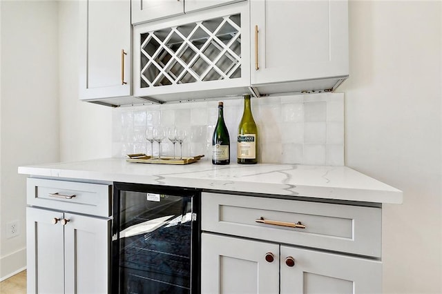5116 Wilson Dr, Metairie, LA 70003 - indoor dry bar with wine cooler and decorative backsplash