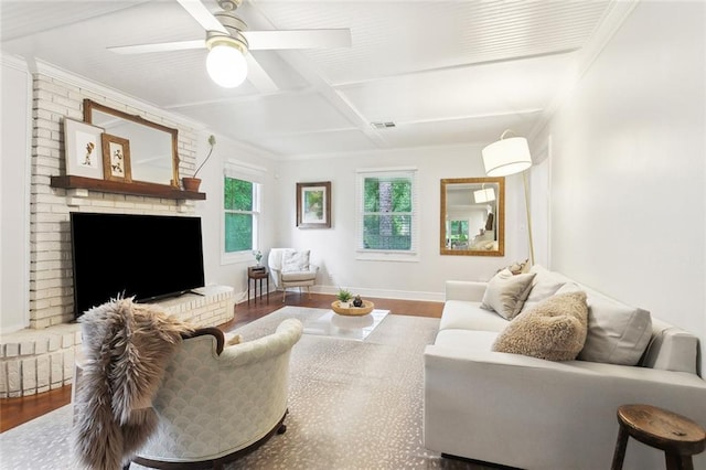 46 Begonia Dr, Covington, LA 70433 - living room with wood finished floors, coffered ceiling, a ceiling fan, ornamental molding, and baseboards