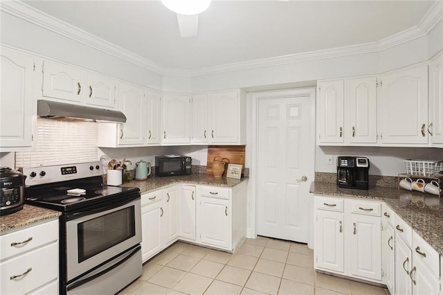 46 Begonia Dr, Covington, LA 70433 - kitchen with under cabinet range hood, electric range, black microwave, light tile patterned floors, and white cabinets