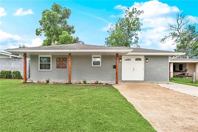400 Sophia St, River Ridge, LA 70123 - single story home with a front yard and brick siding