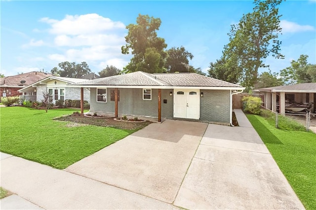 400 Sophia St, River Ridge, LA 70123 - ranch-style home with driveway and brick siding
