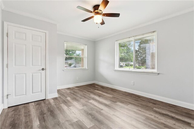 400 Sophia St, River Ridge, LA 70123 - unfurnished room with wood finished floors, baseboards, a ceiling fan, and ornamental molding