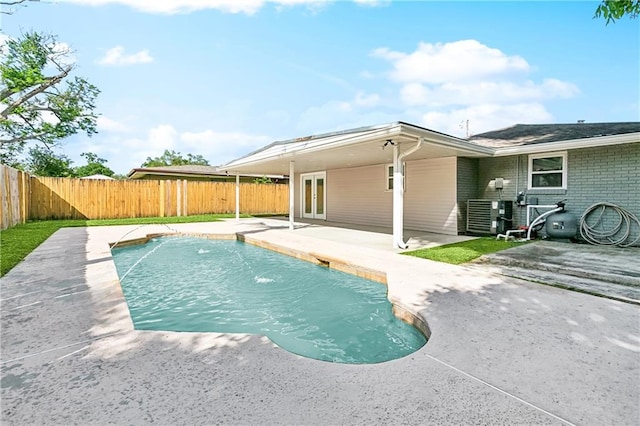 400 Sophia St, River Ridge, LA 70123 - view of pool featuring a patio, a fenced backyard, and central AC unit