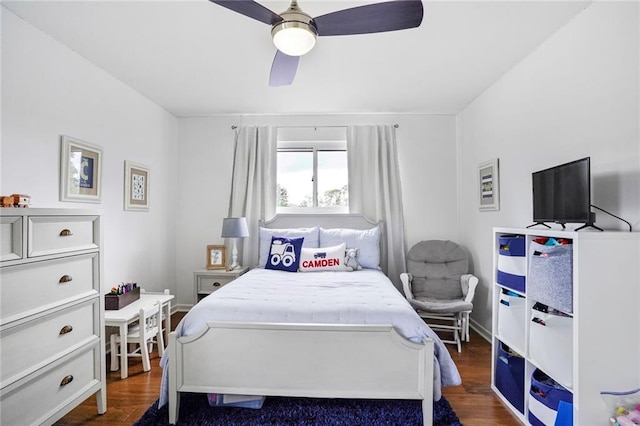 148 Macque Dr, Harahan, LA 70123 - bedroom with dark wood-style flooring and ceiling fan