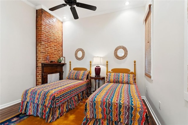 2025 First St, New Orleans, LA 70113 - bedroom with crown molding, baseboards, and ceiling fan