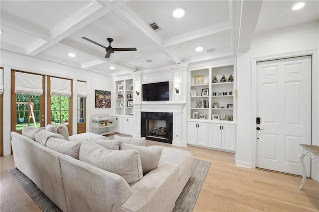 3117 39th St, Metairie, LA 70001 - living area featuring ceiling fan, a fireplace, light wood-style flooring, beamed ceiling, and recessed lighting