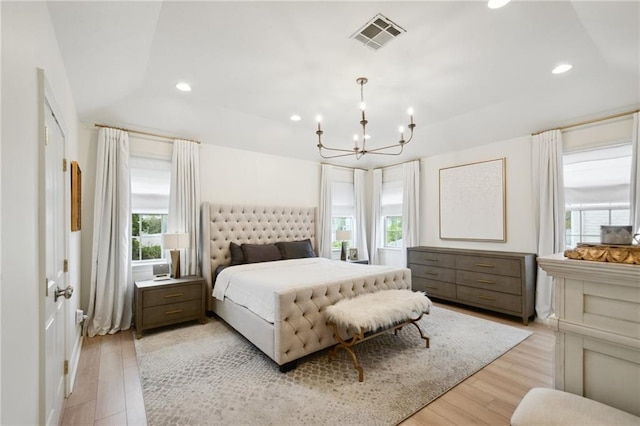 3117 39th St, Metairie, LA 70001 - bedroom featuring multiple windows, a chandelier, light wood-style flooring, and recessed lighting