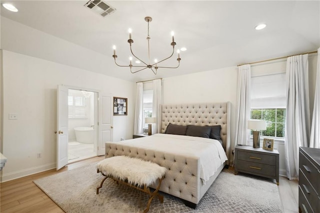 3117 39th St, Metairie, LA 70001 - bedroom with a chandelier, light wood-type flooring, recessed lighting, baseboards, and ensuite bathroom