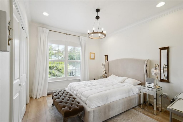 3117 39th St, Metairie, LA 70001 - bedroom featuring wood finished floors, ornamental molding, a chandelier, and recessed lighting