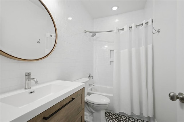 3117 39th St, Metairie, LA 70001 - bathroom featuring tile walls, toilet, shower / bathtub combination with curtain, vanity, and tasteful backsplash