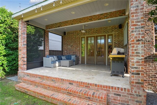 3117 39th St, Metairie, LA 70001 - view of patio featuring french doors and a grill