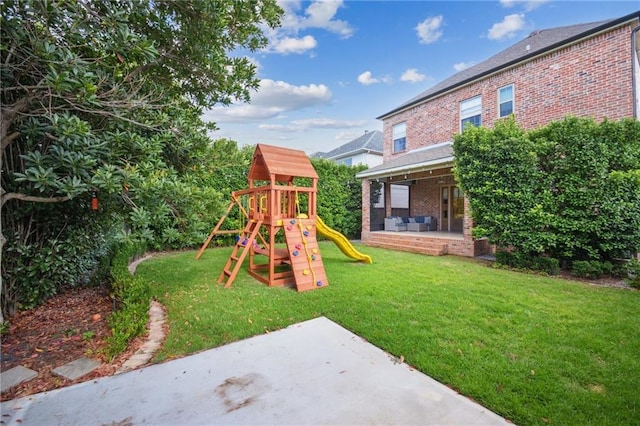 3117 39th St, Metairie, LA 70001 - view of playground with a patio and a lawn